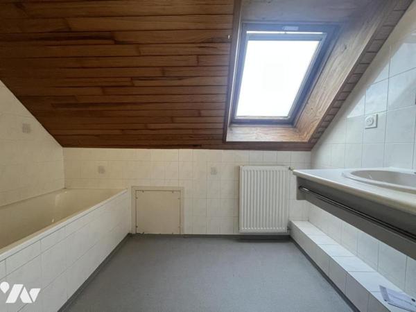 Appartement style duplex au 1er étage