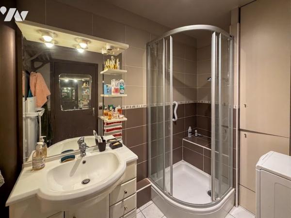 Appartement situé au sein d'une résidence bénéficiant d'un vaste parc arboré, au pied de l'Abbaye