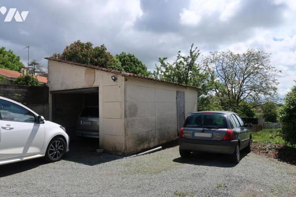 POUZAUGES, MAISON D'HABITATION ANCIENNE AVEC JARDIN ET GARAGE.