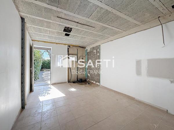 Bien à aménager avec parking proche frontière !