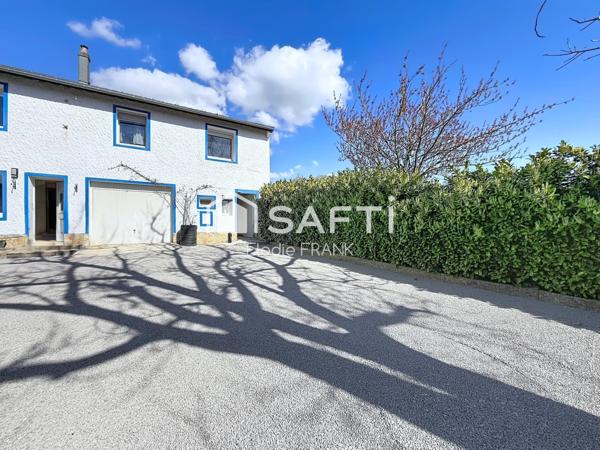 Bien à aménager avec parking proche frontière !