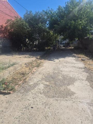 Maison de plain-pied de 95 m² environs avec travaux à prévoir sur un terrain de 509 m² proche de l'aéroport