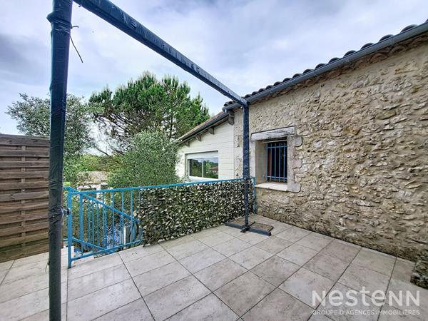 A Vendre Maison de ville en pierre de 136 m² avec jardin au coeur de Gondrin