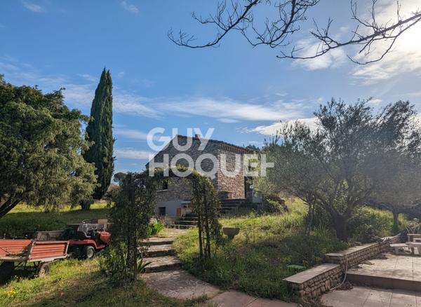 Propriété d'exception à Beaumes-de-Venise : maison en pierre de taille et parc de 5571 m².