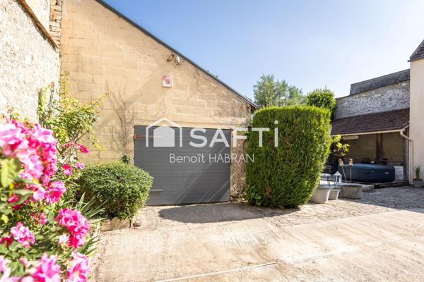 Maison de 200m2, 8 pièces, 4 chambres terrain de 570m2