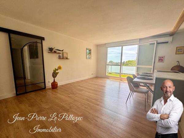 Appartement rénové avec terrasse et garage