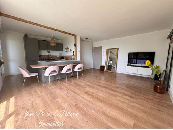 Appartement rénové avec terrasse et garage