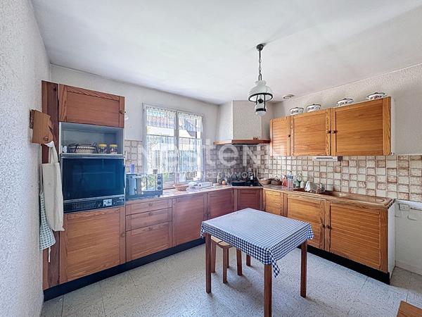 Maison de plain-pied avec jardin et dependance a Morangis (91)