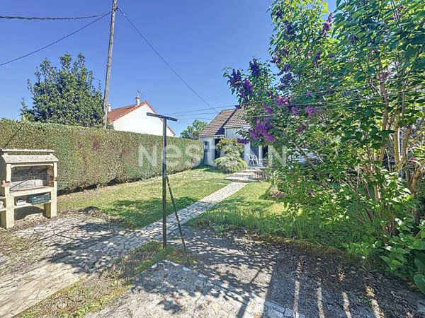 Maison de plain-pied avec jardin et dependance a Morangis (91)