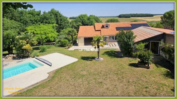 Maison contemporaine avec piscine, appartement indépendant et vaste terrain arboré