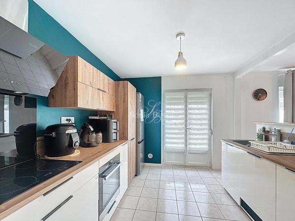 MAISON DE RESIDENCE SEMI MITOYENNE 4 CHAMBRES GARAGE JARDIN