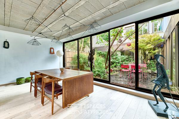 Appartement loft d’exception avec jardin – Quartier Trudaine