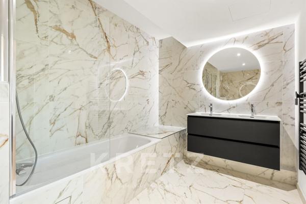 Appartement familial en plein coeur de Neuilly dans une résidence neuve haut de gamme.