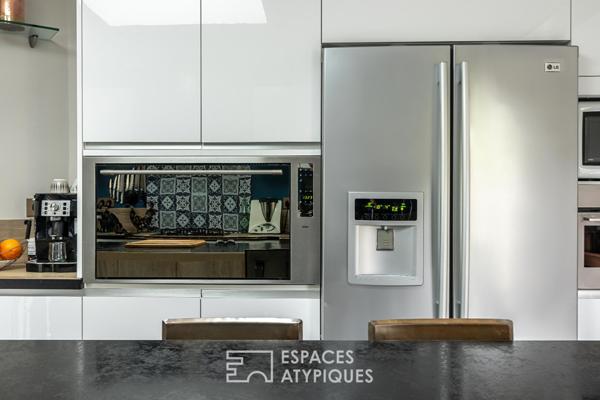 Maison de plain-pied au calme, 5 chambres, double garage.