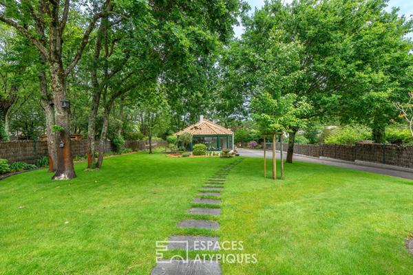 Maison de plain-pied au calme, 5 chambres, double garage.