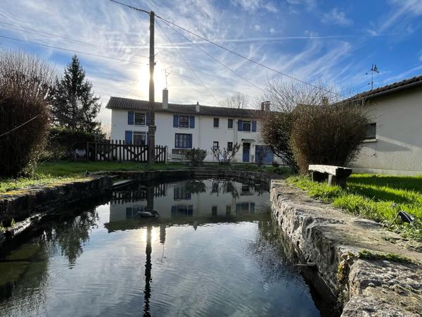 Five-bedroom longère-style house with garages, large plot of