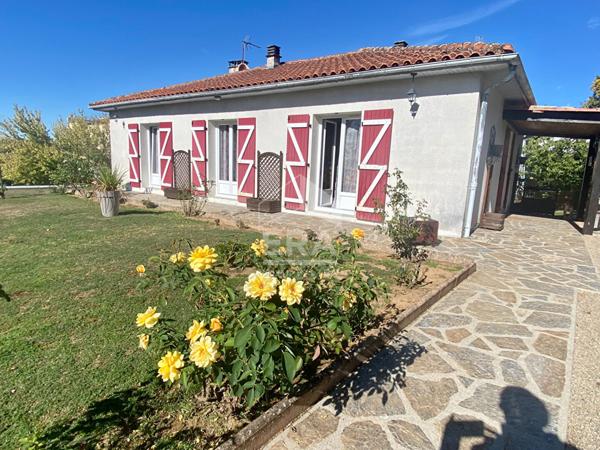 Maison sur sous-sol avec accès plein pied à deux pas du centre ville