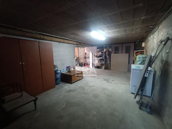 Maison sur sous-sol avec accès plein pied à deux pas du centre ville