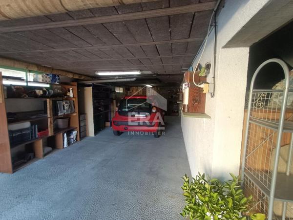 Maison sur sous-sol avec accès plein pied à deux pas du centre ville