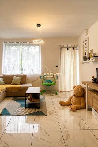 Maison familiale rénovée avec jardin et garage