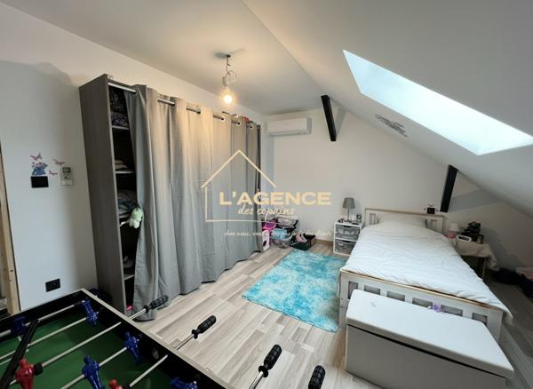 Maison familiale rénovée avec jardin et garage