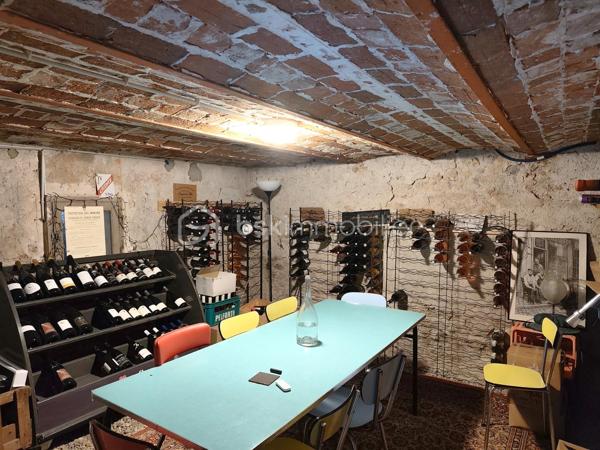 🌟 COUP DE CŒUR – Magnifique Maison de Ville de 200 m²
Le charme de l’ancien, le confort du moderne | 7 Chambres | Dépendance de 100 m²

Découvrez cette perle rare sur le marché : une demeure d’exception alliant élégance et modernité. Située dans un environnement privilégié, au calme absolu et sans aucune nuisance, elle vous offre le luxe rare de profiter du centre-ville entièrement à pied.

📦 Aucun travaux à prévoir : vous n'avez plus qu'à poser vos valises !

🏡 Des volumes généreux & une distribution idéale:
Rez-de-chaussée (92 m²) : L'espace de vie (65 m²)
- Accueil : Entrée chaleureuse et accueillante.
- Cuisine : Aménagée et entièrement équipée, ouverte sur une salle à manger conviviale.
- Salon : Lumineux et cosy, sublimé par un poêle à bois performant.
- Nuit : Une première chambre avec sa salle d'eau privative.
- Commodités : WC indépendants.

1er Étage : Le confort des maîtres des lieux
- Un palier fluide desservant l'espace nuit.
- Suite parentale d'exception avec un grand dressing et une salle de bains complète (baignoire + douche).
- 2 chambres supplémentaires, dont une disposant de sa propre salle d’eau.

2ème Étage : L'espace enfants ou télétravail
- Palier fonctionnel.
- 3 chambres lumineuses et parfaitement agencées.
- Une salle d'eau indépendante avec WC.

Sous-sol : Le paradis des amateurs de vin
- Sous-sol total offrant une très grande capacité de stockage.
- 2 superbes caves voûtées, idéales pour la conservation ou pour créer un espace de dégustation atypique.

🌳 Les extérieurs : Un véritable havre de paix en ville
- Le Jardin : Joliment aménagé et arboré, entièrement préservé des regards (sans vis-à-vis).
- La Terrasse : Équipée d'une belle pergola, idéale pour vos repas d’été et vos moments de partage.

🔥 LE GRAND PLUS : Une dépendance de 100 m² à rénover. Un potentiel incroyable pour un artisan, une profession libérale, un atelier d'artiste, ou pour la création d'un gîte / investissement locatif.

📌 Les points forts à retenir:
- Surface habitable 200 m²
- Nombre de chambres: 7 chambres au total
- État général impeccable (matériaux de qualité, aucun frais à prévoir)
- Emplacement: Secteur recherché, calme absolu, centre-ville à pied
- Potentiel: 100 m² d'annexe modulable selon vos projets

📞 Une opportunité rare sur le secteur. Contactez-moi dès aujourd'hui pour organiser une visite !