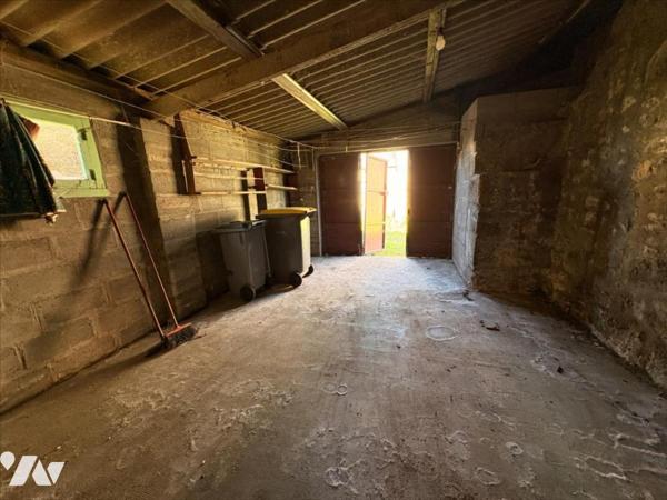 Maison de bourg en pierres pleine de charme à rénover - fort potentiel