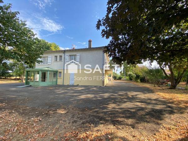 Maison familiale avec du potentiel!
