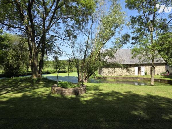 Maison de caractère XVème 160m2 avec maison annexe sur terrain de 2.23ha 