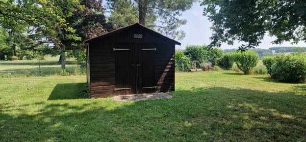 Pavillon 5 pièces - 125 m² - 4 ch - garage et dépendances - jardin arboré