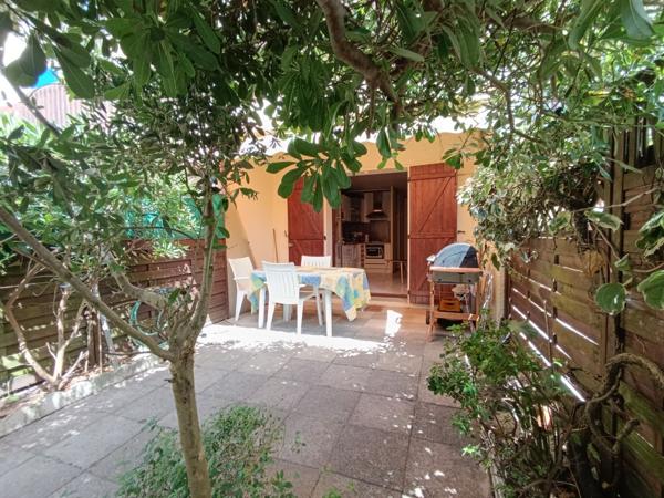 Appartement 3 pièces en rez-de-jardin + parking privé