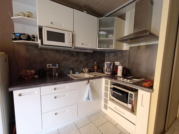 Appartement 3 pièces en rez-de-jardin + parking privé