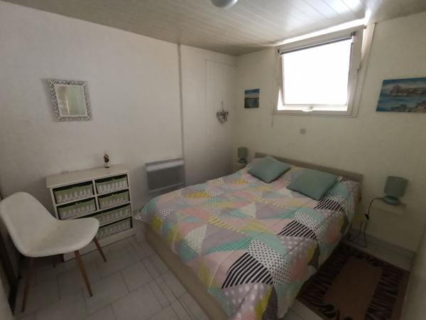 Appartement 3 pièces en rez-de-jardin + parking privé