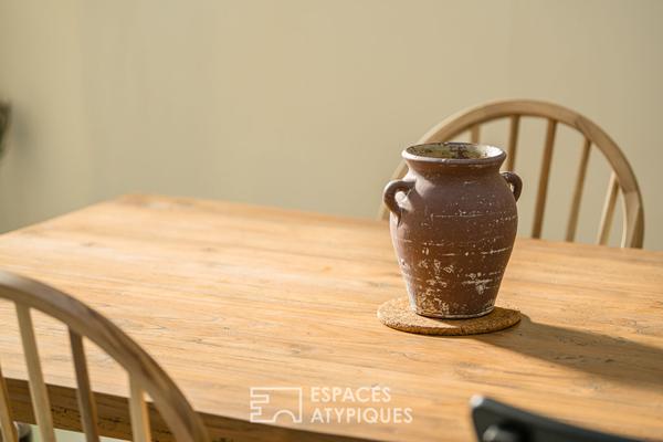 Maison en pierre avec garage et jardin