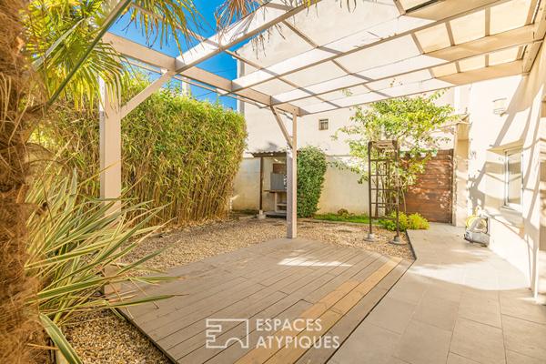 Maison en pierre avec garage et jardin