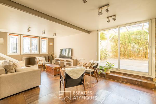 Maison en pierre avec garage et jardin