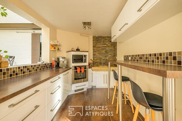 Maison en pierre avec garage et jardin