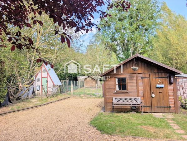 EN EXCLUSIVITÉ – Maison en bois avec jardin dans le bourg de Vaulandry