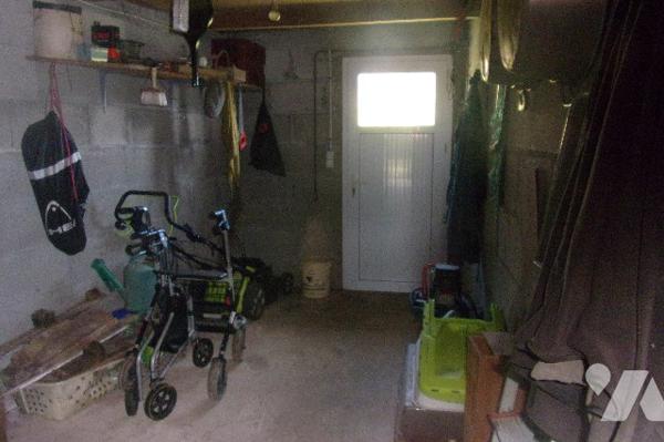 Maison  1 pièce de vie avec cuisine ouverte ,1 salle de bains 3 chambres,1WC, 1 cellier,1 garage