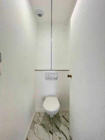 Appartement rénové F5 avec balcon, cave et grenier