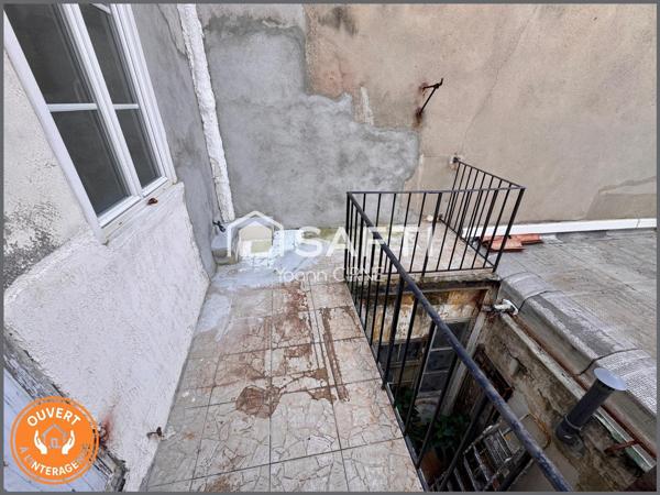 Appartement T1 bis 28 m2  à rénover centre ville avec balcon