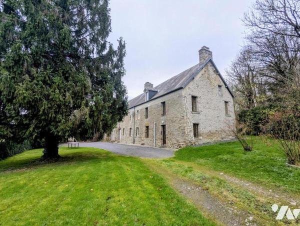 Maison en pierre avec dépendances et terrain