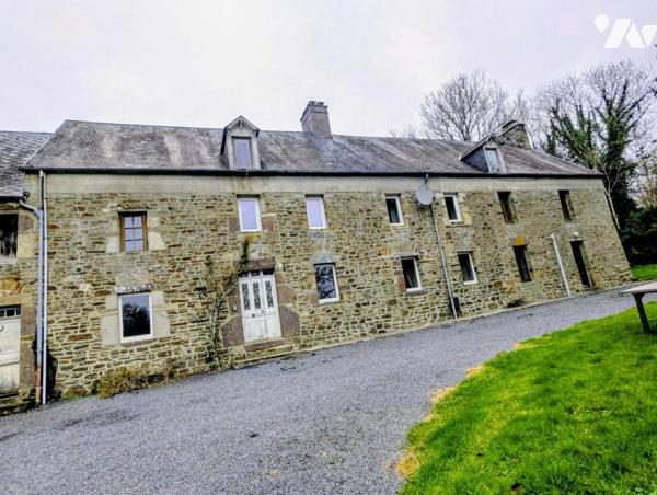 Maison en pierre avec dépendances et terrain
