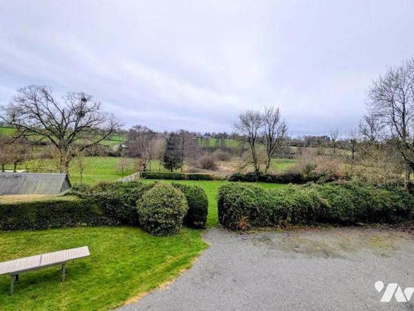 Maison en pierre avec dépendances et terrain