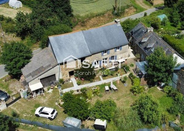 Propriété composée de deux maisons, un garage, atelier,  édifiée sur un terrain de 1240m2