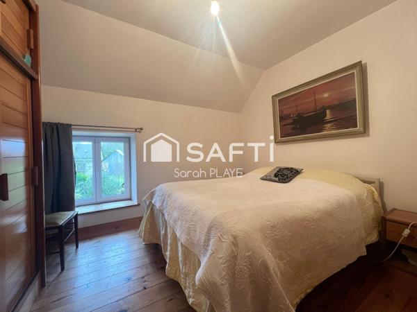 Propriété composée de deux maisons, un garage, atelier,  édifiée sur un terrain de 1240m2