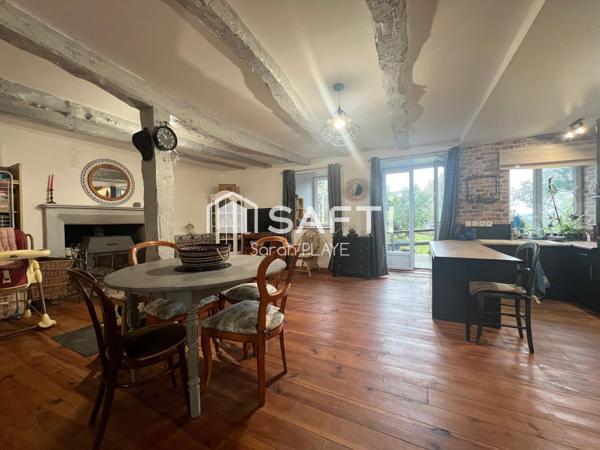 Propriété composée de deux maisons, un garage, atelier,  édifiée sur un terrain de 1240m2