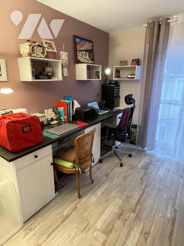 Appartement de type 3, 2 chambres, parking en sous-sol, cave.