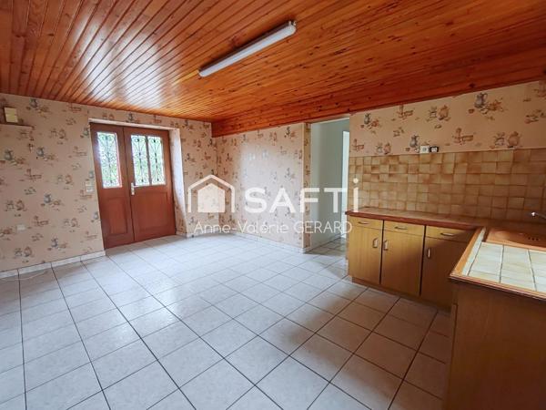 Maison de plain pied 101m² en pierre+dépendances