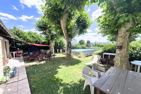 Maison de caractère - 230 m² – 5 chambres – Jardin paysager – Garage 3 véhicules – Cave de réception